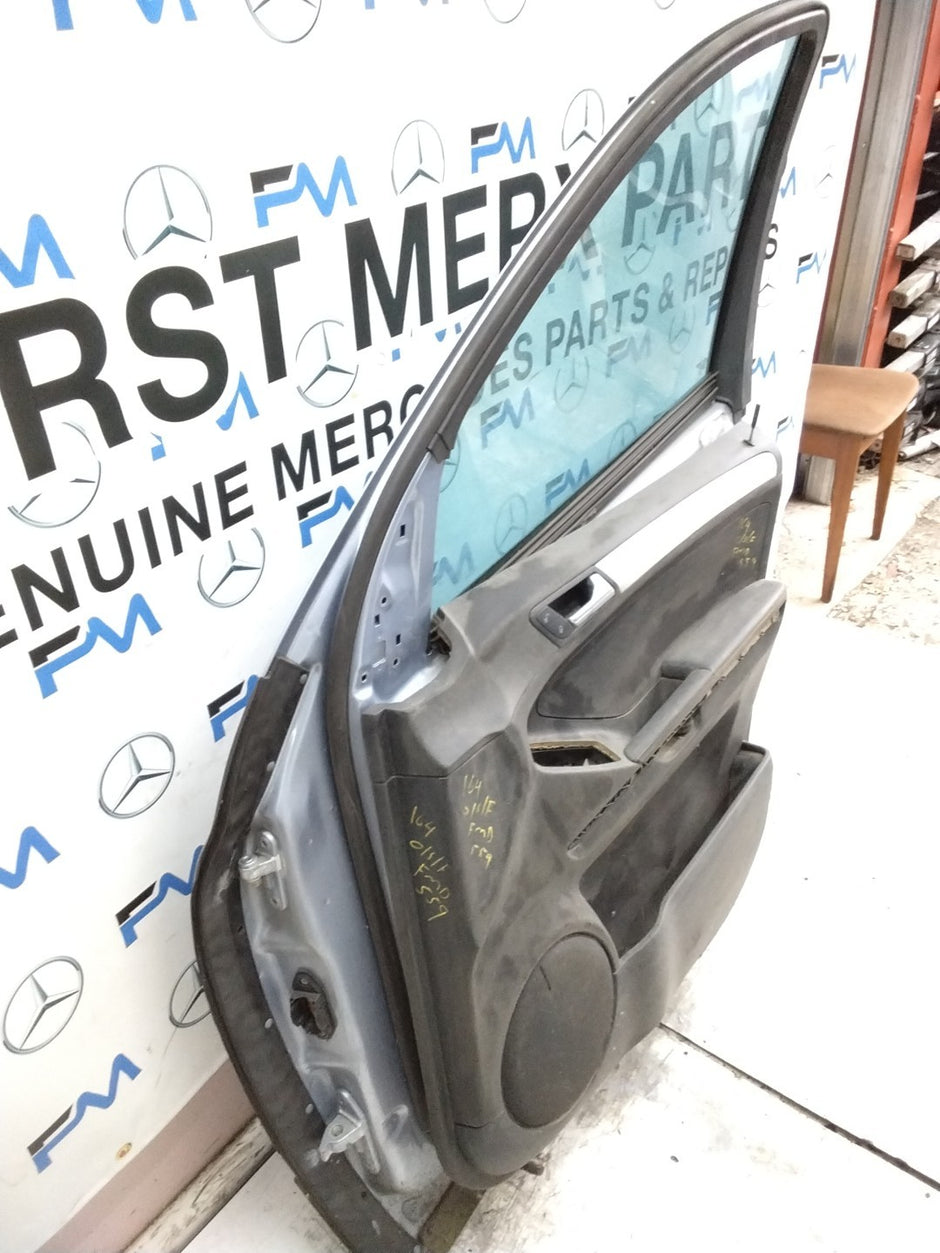 MERCEDES M-CLASS W164  DRIVER FRONT DOOR OSF  2005-2011 SILVER  FMD559