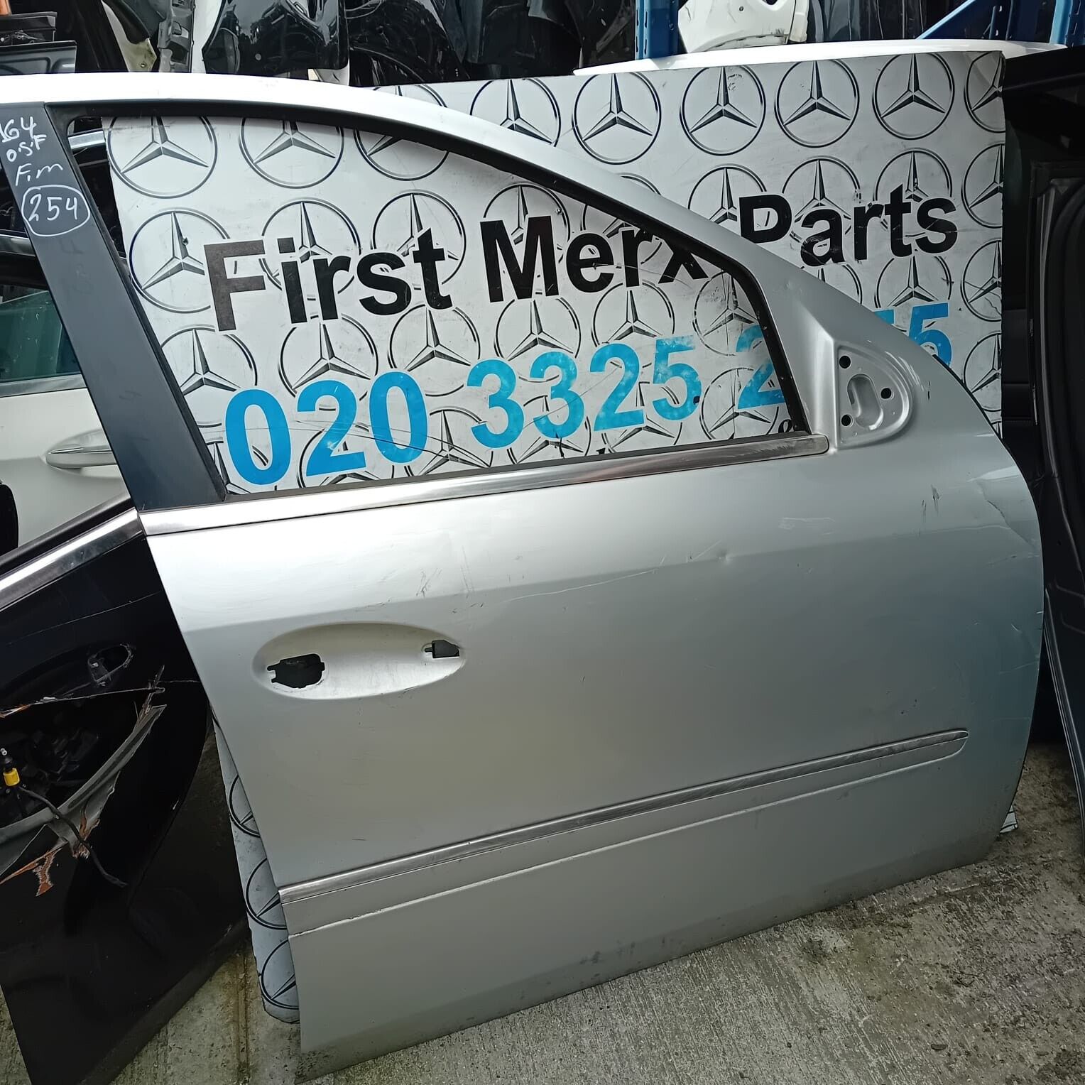 MERCEDES BENZ ML  W164  DRIVER SIDE FRONT DOOR ( OFF SIDE FRONT )