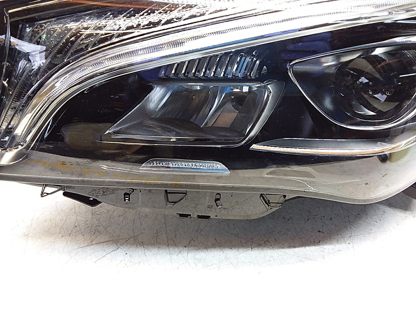  MERCEDES W117 PASSENGER HEADLIGHT FMH286